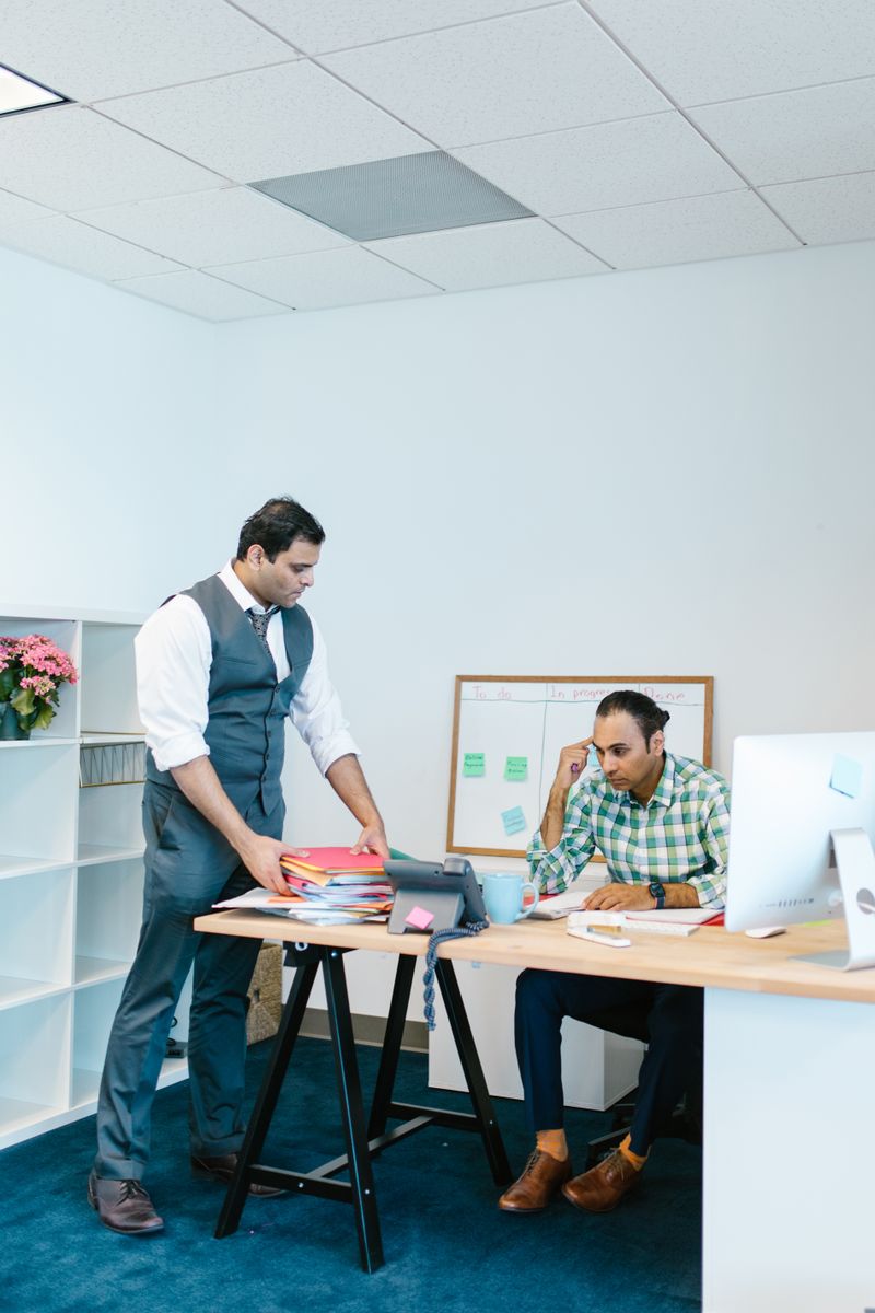 A sales team working together in a bright office